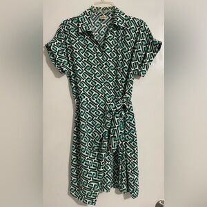 Wrap dress. Length: over the knee